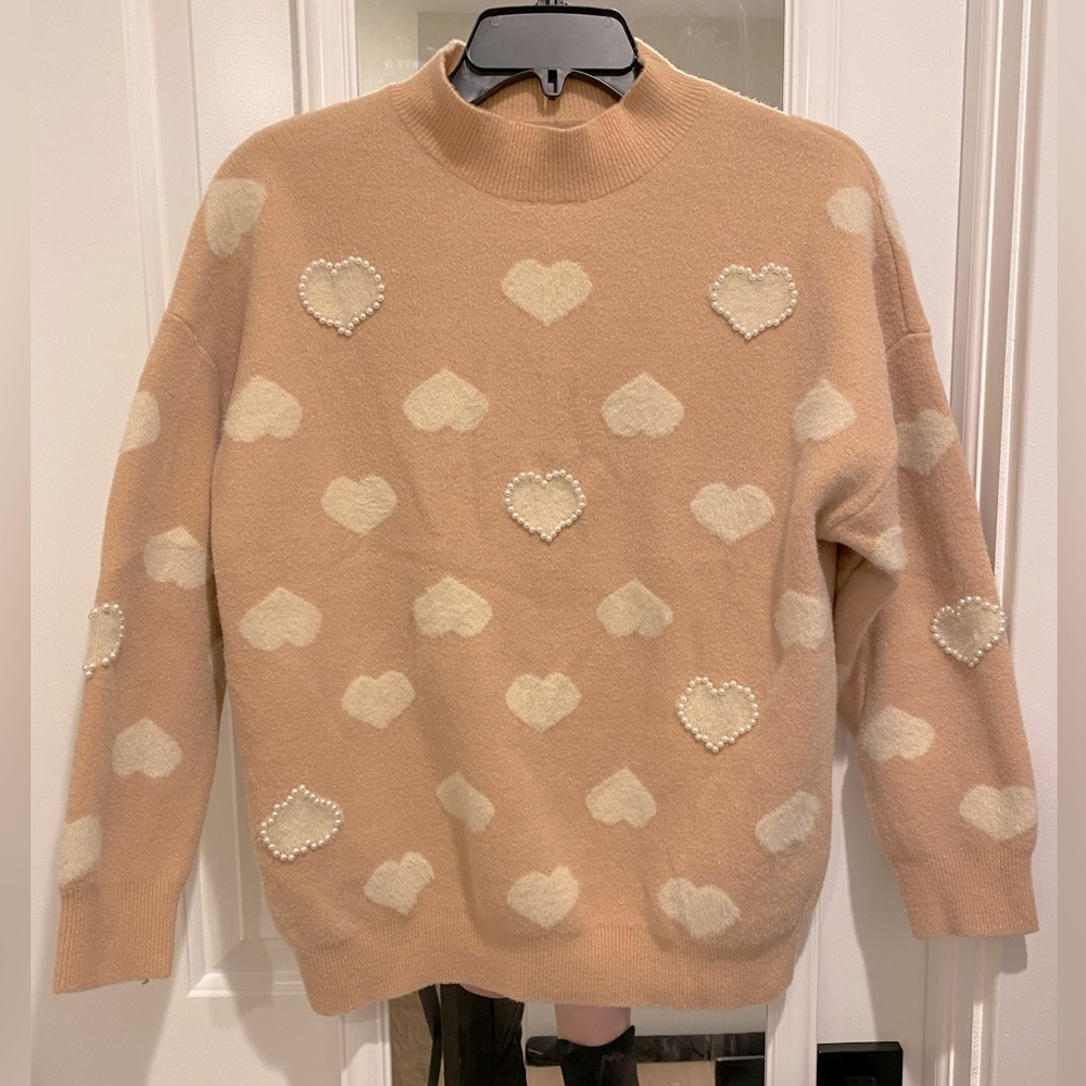 Sweater with pearl heart details!